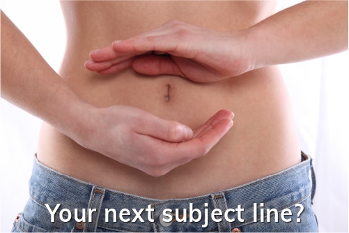 Picture of a woman's stomach, with her hands surrounding her belly button, which could be an excellent email marketing tool.
